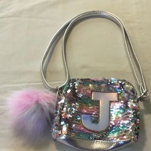 I’m selling a justice bag that is new! For girls
